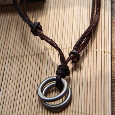 袋口双拉绳的穿法？武器双环圈